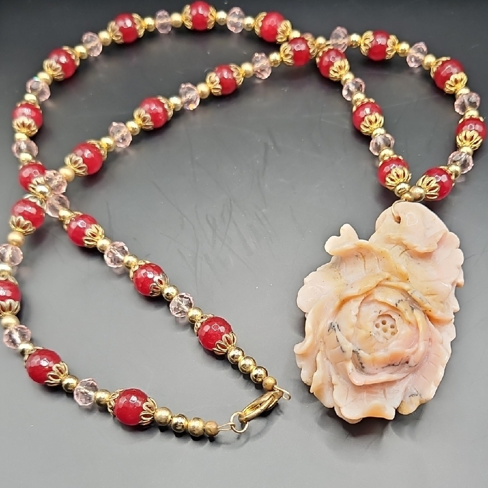 Elegant Ruby and Gold Beaded Necklace with Rose Pendant